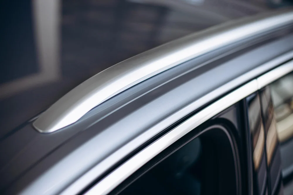 Aluminum strip automotive roof rail trim closeup