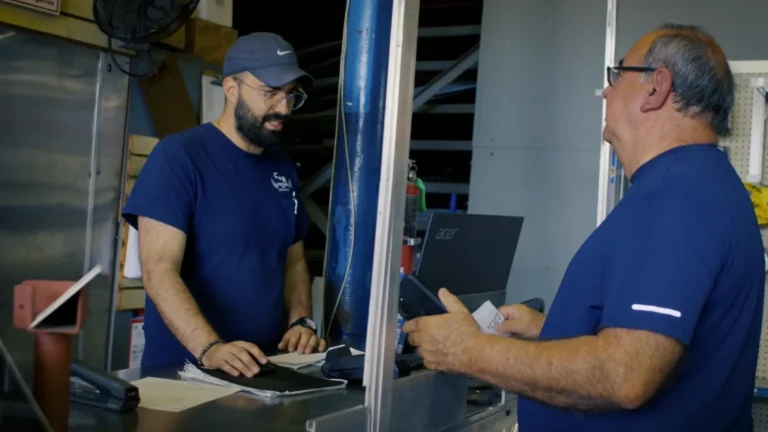 C&R Metals team member serving customer in-store